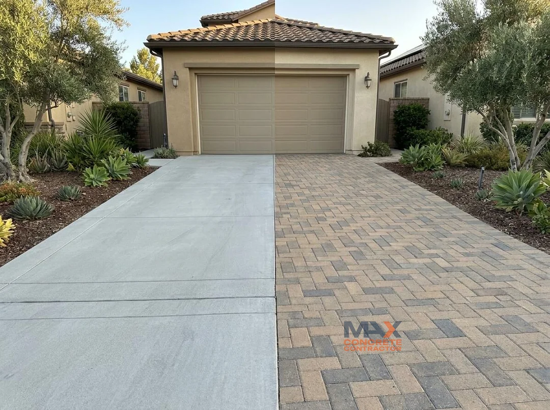 Side by side comparison of a poured concrete driveway and an interlocking paver driveway in Irvine, CA